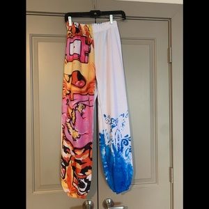 White joggers with rugrats sprayed painted on it